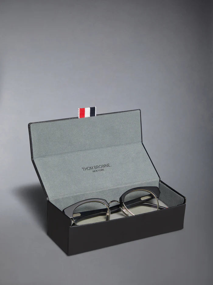 OVAL EYEGLASSES IN TITANIUM 49 MATTE SILVER CLEAR