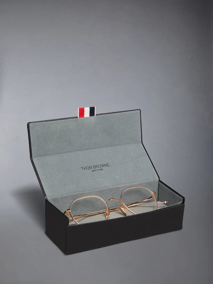 ROUND EYEGLASSES IN TITANIUM 52 ROSE GOLD CLEAR